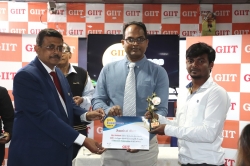 1st Topper Avinash Kumar -BCA 4th Sem Receiving Trophy and Certificate from Dr. Rajiv